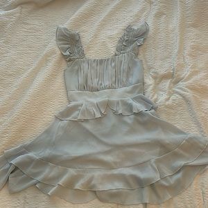 Getting rid of a light blue ruffle dress. Worn once for Halloween. Byinns brand.